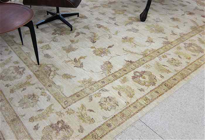 Appraisal: HAND KNOTTED ORIENTAL CARPET Pakistani Oushak overall meandering floral vine