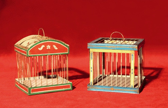 Appraisal: COLLAPSIBLE CAGES Two small collapsible bird-cages Painted blue or green