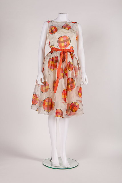 Appraisal: A s summer dress with a fun orange yellow and