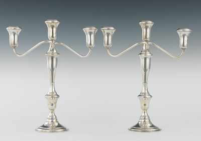 Appraisal: A Pair of AMC Sterling Silver Convertible Candlesticks Weighted sterling