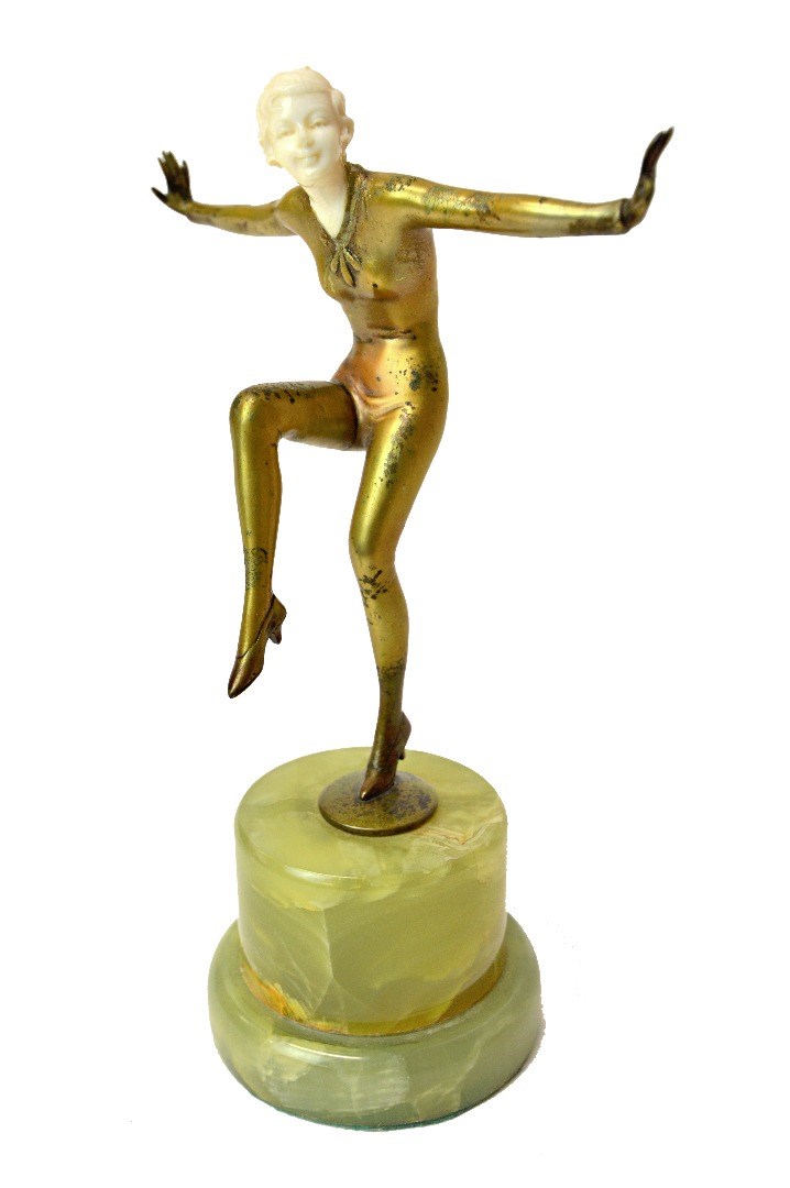 Appraisal: A Lorenzl style Art Deco bronze and ivory figure modelled