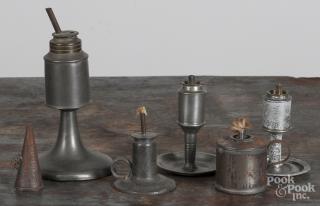 Appraisal: Four American pewter oil lamps th c together with a