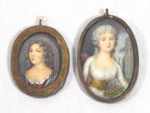 Appraisal: Two portrait miniatures on ivory of beauties one cm x