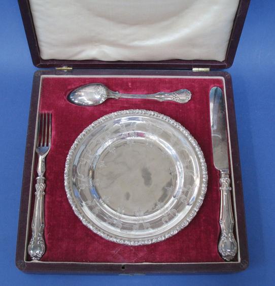 Appraisal: A VICTORIAN CHRISTENING SET comprising knife fork spoon and circular