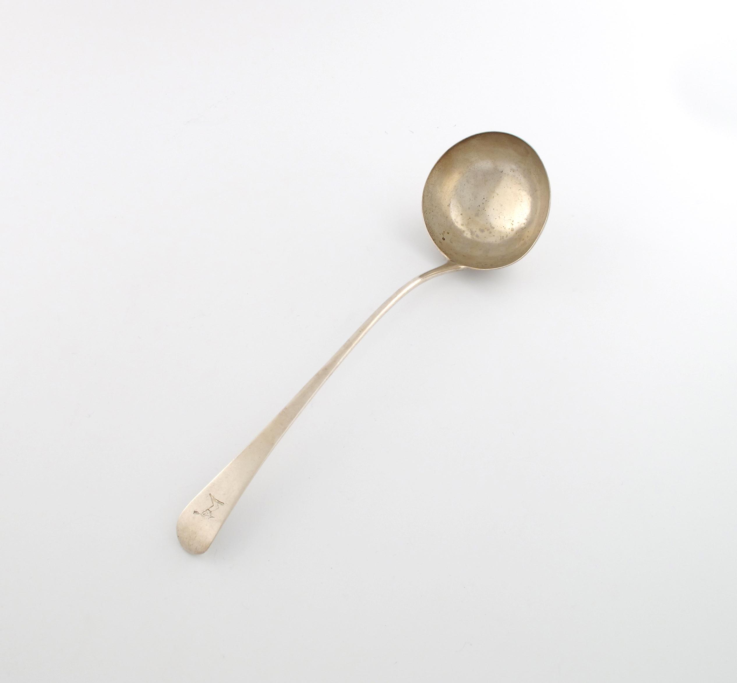 Appraisal: A George III silver old English pattern soup ladle