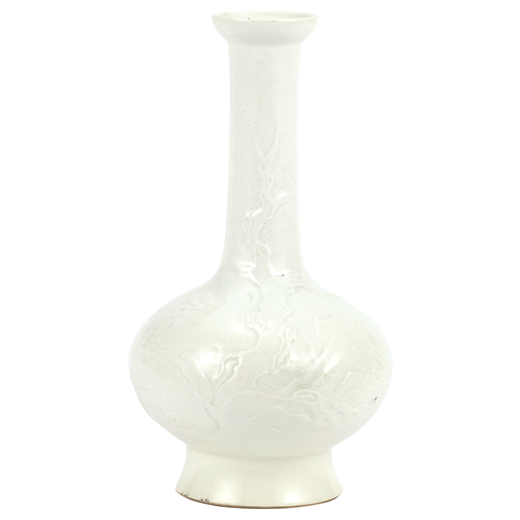 Appraisal: Chinese White Glazed Porcelain Bottle Vase th Century The bulbous