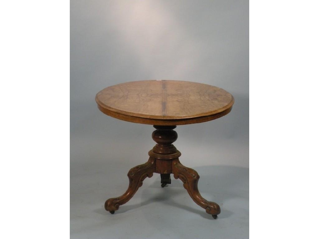 Appraisal: A Victorian walnut breakfast table the oval quartered top inlaid