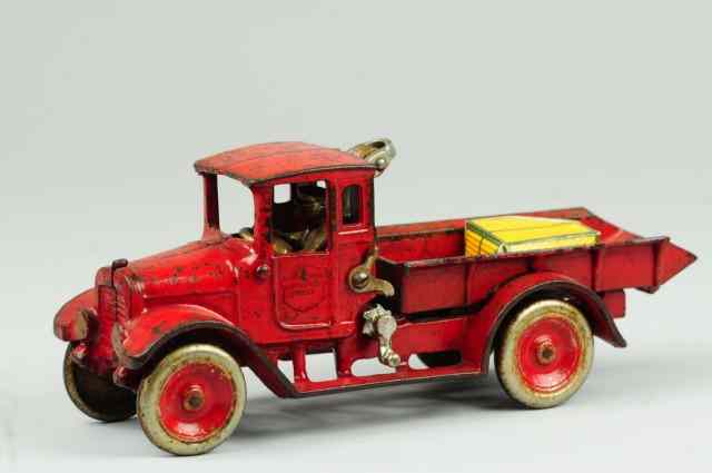 Appraisal: IH RED BABY DUMP TRUCK Arcade cast iron painted in