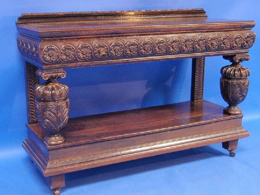 Appraisal: An early thC carved oak buffet with single frieze drawer