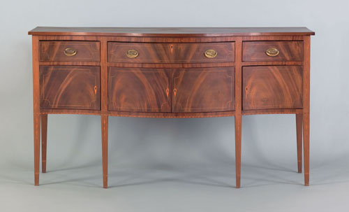 Appraisal: Mid Atlantic Hepplewhite mahogany serpentine front sideboard ca with vine