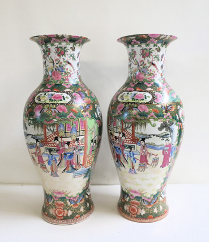 Appraisal: TWO CHINESE FAMILLE ROSE BALUSTER VASES with hand painted reserves