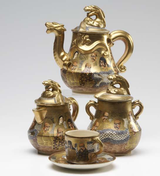 Appraisal: SATSUMA TEASET With dragon spout and finials painted with religious