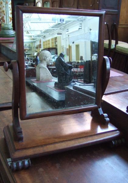 Appraisal: A th century mahogany swing frame toilet mirror raised on