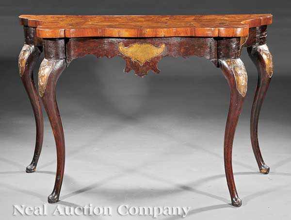 Appraisal: A Continental Parcel Gilt Carved and Inlaid Walnut Console Table