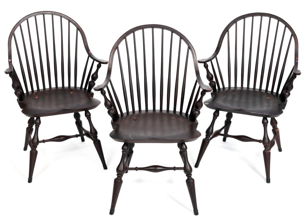 Appraisal: THREE WINDSOR CONTINUOUS ARMCHAIRS TH CENTURY BACK HEIGHTS SEAT HEIGHTS