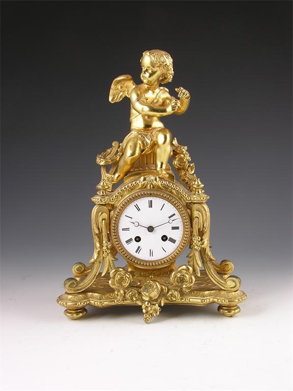 Appraisal: A gilt spelter mantel clock