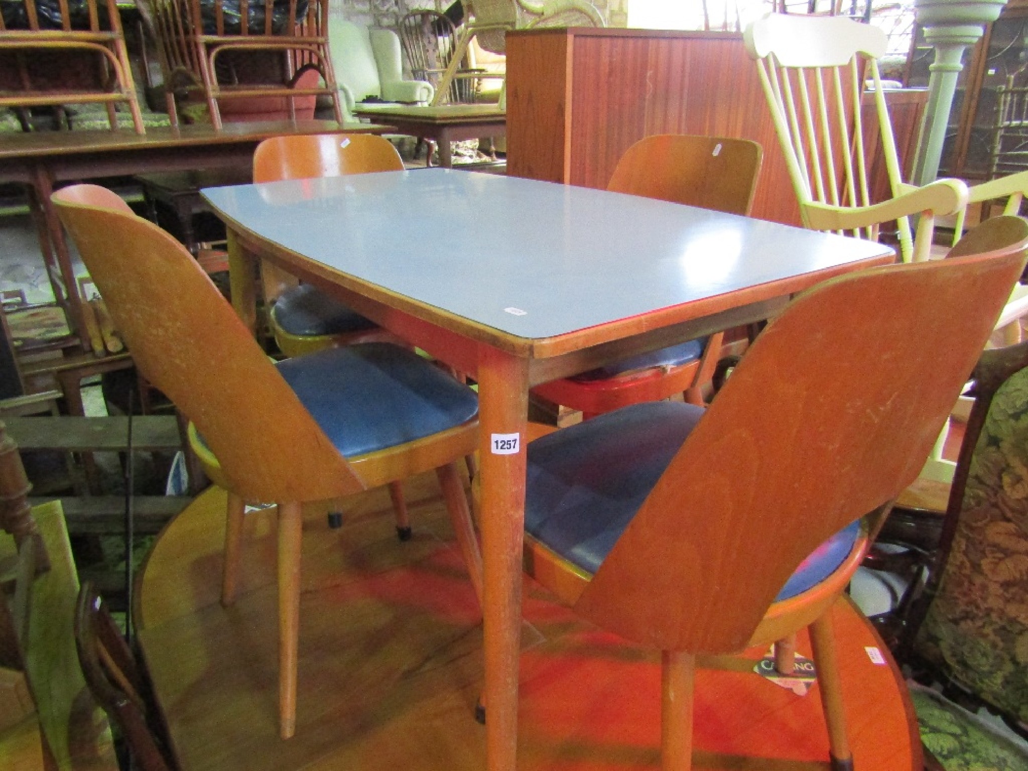 Appraisal: A mid th century beechwood kitchen table of rectangular form