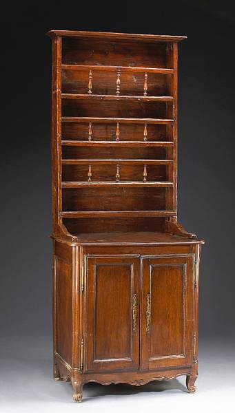 Appraisal: A Louis XV style walnut vaisselier th century and later