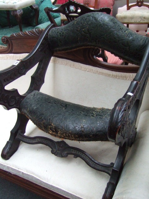 Appraisal: A late th century Italian ebonised 'X' frame stool of