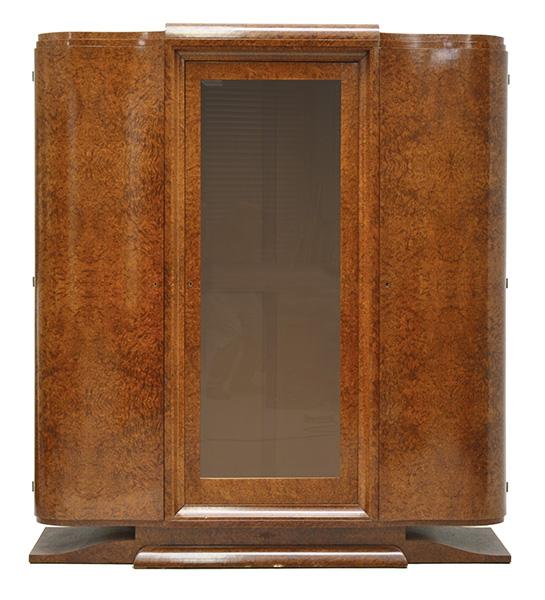 Appraisal: AN ART DECO BIRDSEYE VENEERED VITRINE with undulating moulded side