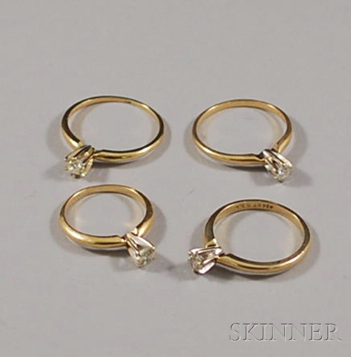 Appraisal: Four Small kt Gold and Diamond Solitaire Rings sizes to