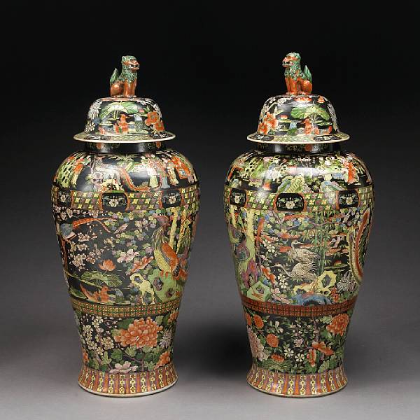 Appraisal: A pair of massive famille noire enameled porcelain covered jars