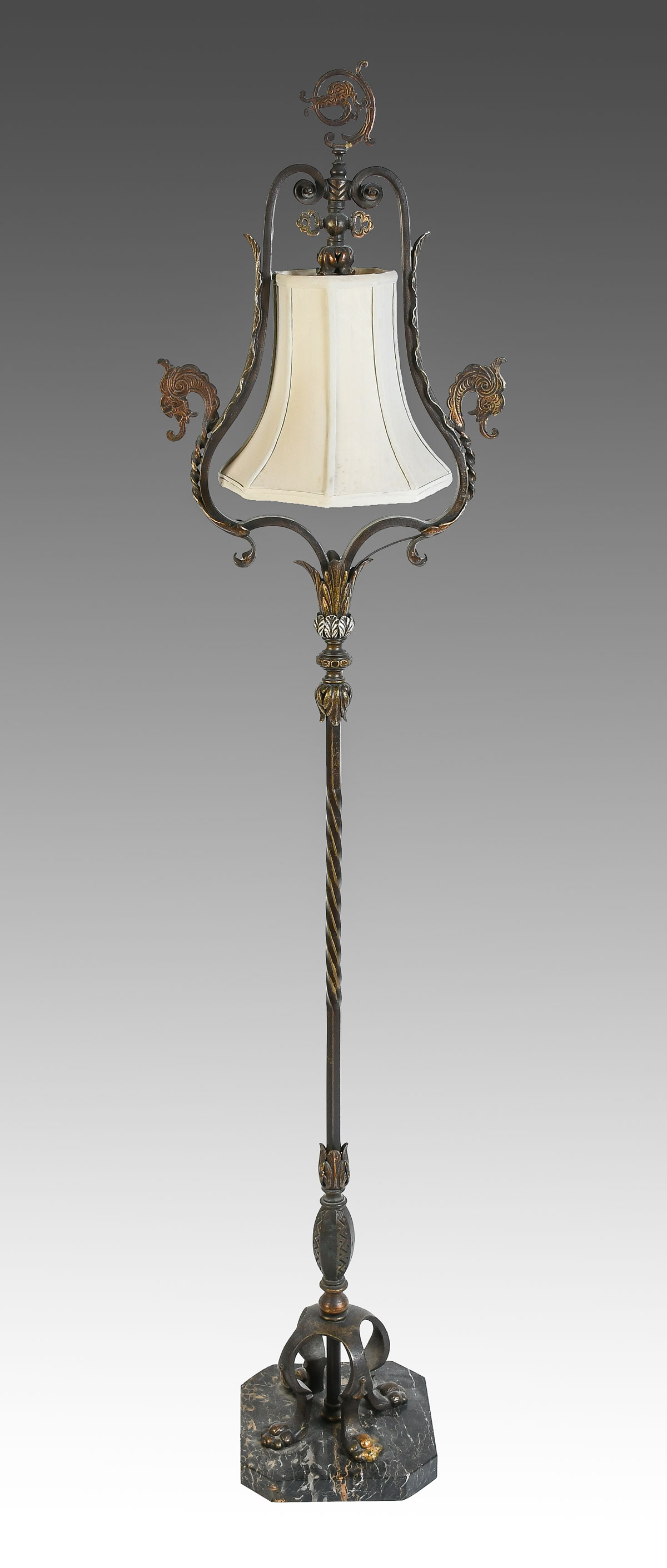 Appraisal: ORNATE WROUGHT IRON FLOOR LAMP Wrought iron single light floor