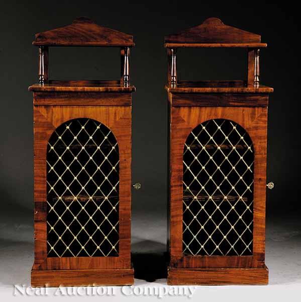 Appraisal: A Pair of Regency-Style Mahogany Pedestal Cabinets each having tiered