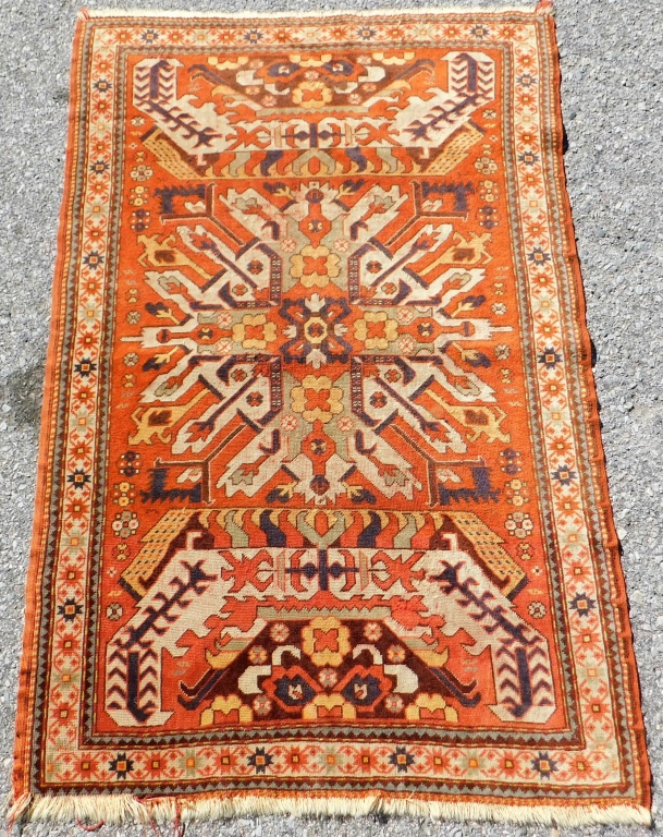 Appraisal: SINGLE EAGLE KAZAK RUG Middle East th CenturyYellow navy blue