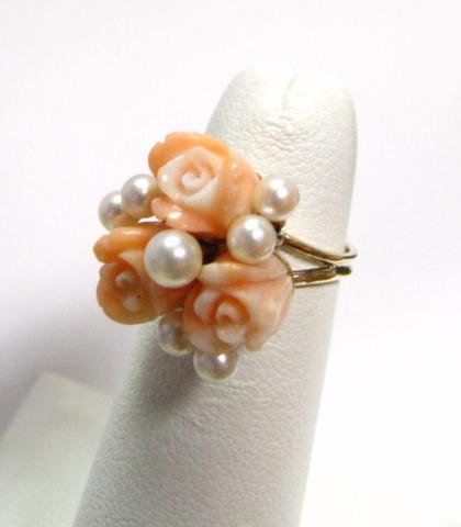 Appraisal: Lady's K yellow gold carved coral and pearl ring in