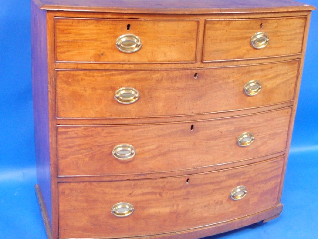 Appraisal: A George III bow fronted figured mahogany chest of two