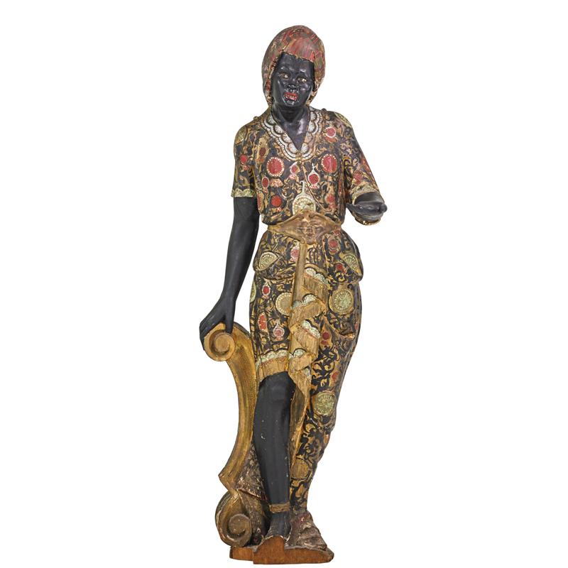 Appraisal: BLACKAMOOR WOOD-CARVED STATUE Polychrome decorated wood-carved figure of a woman