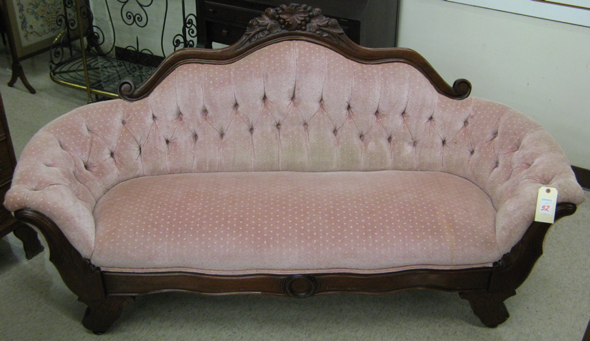 Appraisal: VICTORIAN SETTEE American c having a buttoned back surmounted by