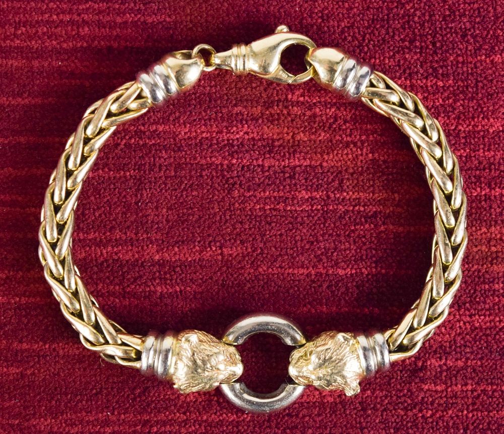 Appraisal: K Gold Braided Chain Bracelet with Panther Heads K gold