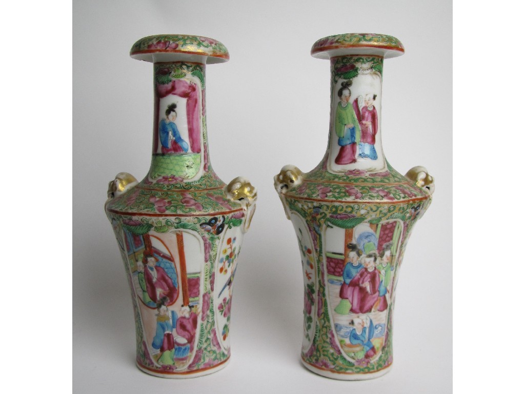 Appraisal: A pair of Canton famille rose baluster vases painted with