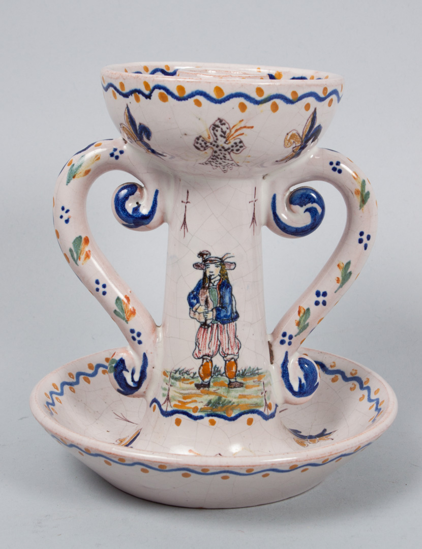 Appraisal: Malicorne faience chamberstick late th century double handled chamberstick with