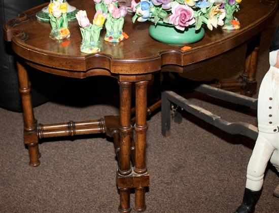 Appraisal: Regency style fruitwood coffee table Estimate - All property is