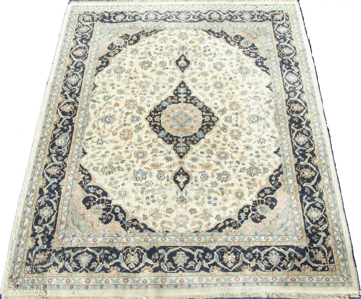 Appraisal: INDO-KASHAN DESIGN CARPET A lobed diamond medallion with matching pendants