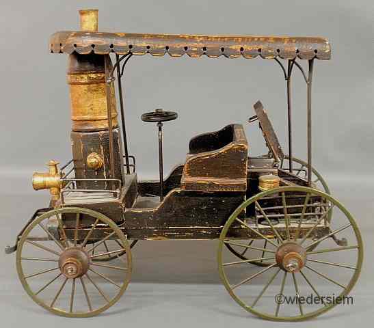 Appraisal: Copy of an early 's steam car toy with distressed