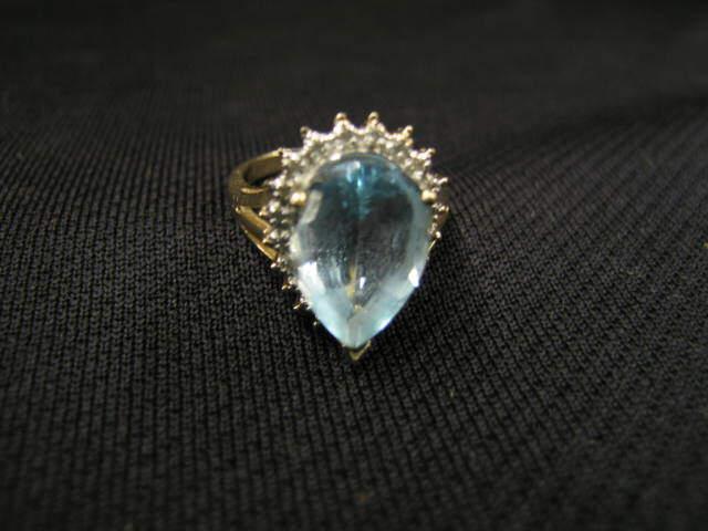 Appraisal: Blue Topaz Diamond Ring carat pear shaped gem surrounded by