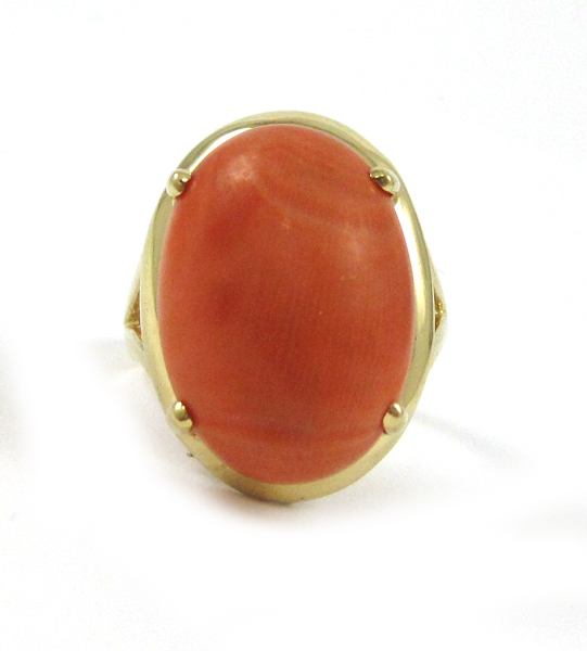 Appraisal: CORAL AND FOURTEEN KARAT GOLD RING with four yellow gold