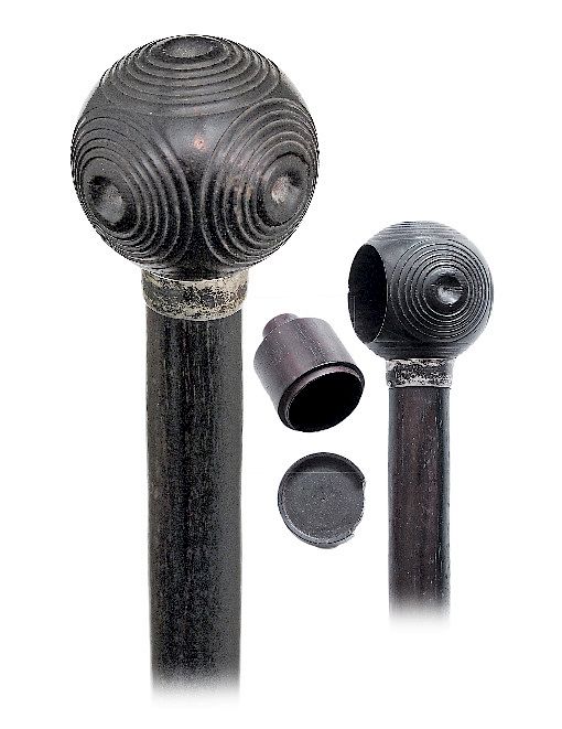 Appraisal: Ebony Puzzle Container Cane -Ca -Ebony ball knob turned with