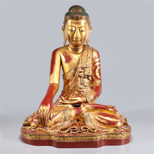 Appraisal: Large antique Thai gilt and lacquered seated figure of Buddha