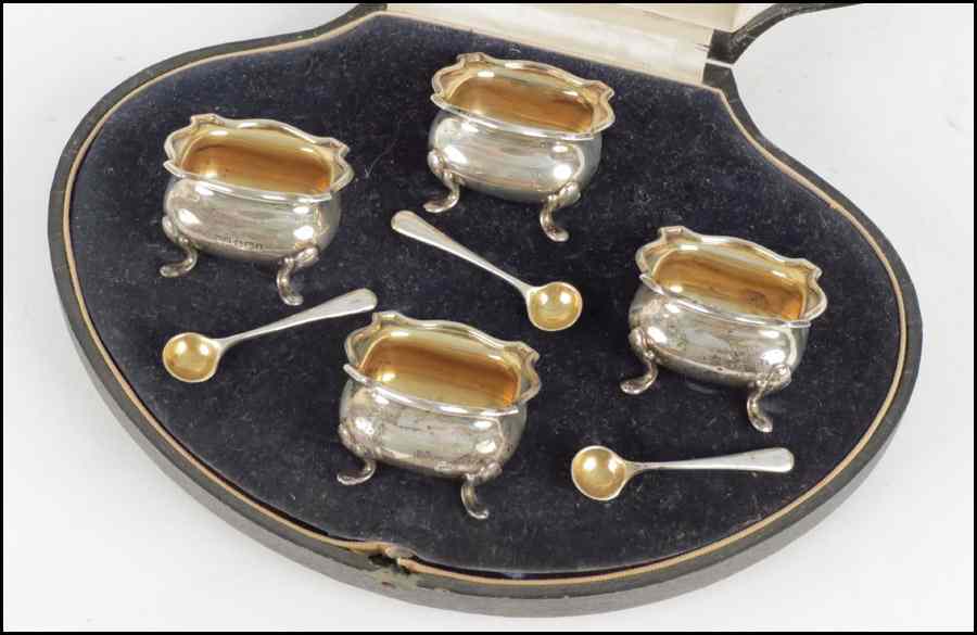 Appraisal: SET OF FOUR ENGLISH SILVER SALT CELLARS All bearing goldwashed