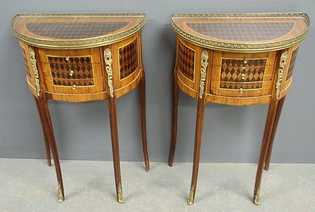 Appraisal: - Pair of Louis XVI style inlaid mahogany demilune end