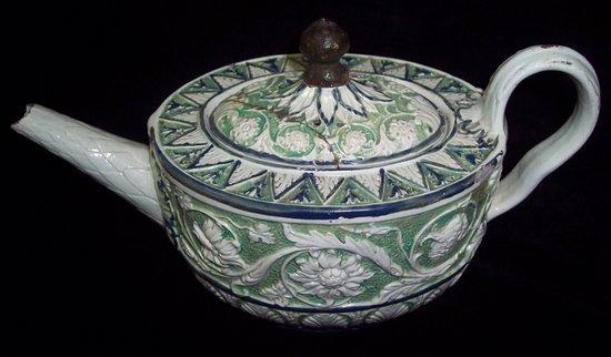 Appraisal: Additional LotA pearlware teapot and cover with moulded scrollwork and