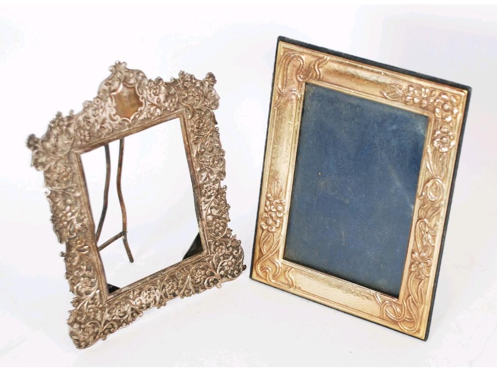 Appraisal: CONTINENTAL STERLING SILVER PHOTOGRAPH FRAMES oblong with embossed floral decoration