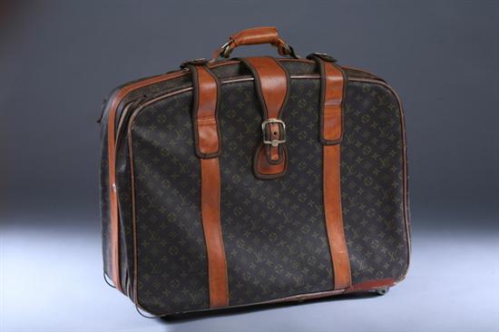 Appraisal: VINTAGE LOUIS VUITTON LEATHER SUITCASE Soft body in LV logo