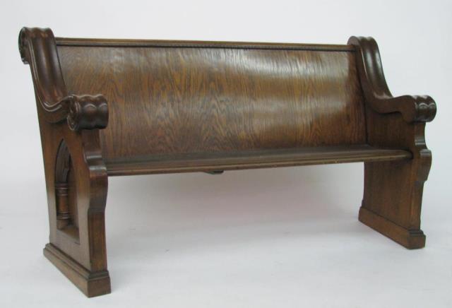 Appraisal: An antique oak church pew with Gothic arch carving long