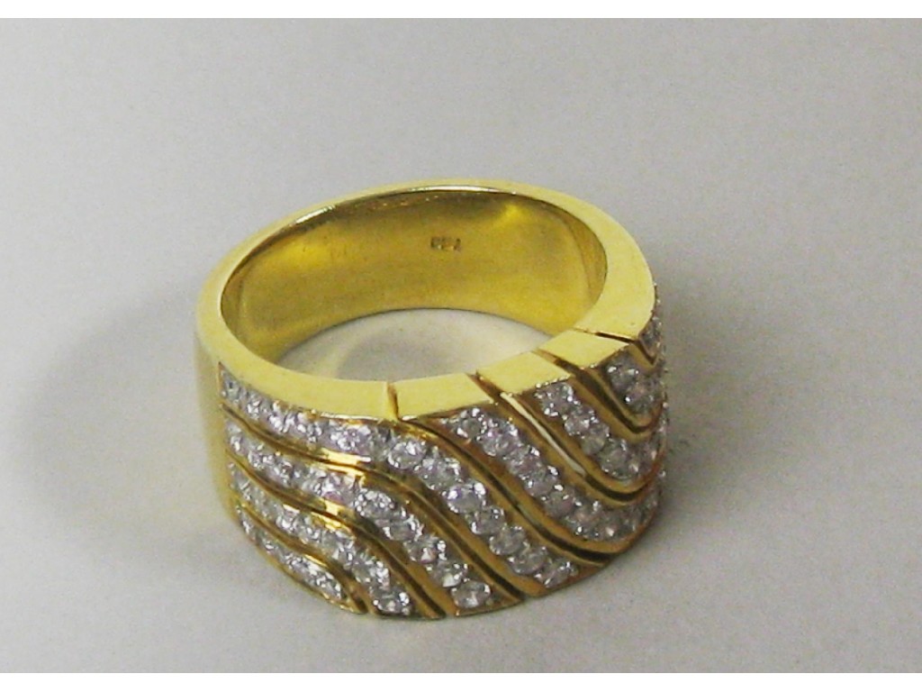 Appraisal: A Continental Diamond Ring pav -set numerous brilliant-cut stones in